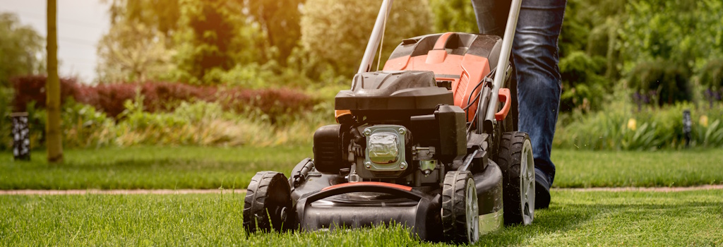 man mowing yard